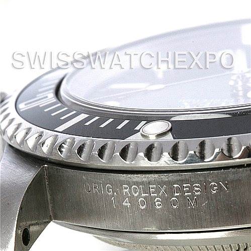 The close-up angle displays the side and bezel of the Rolex Submariner 14060M Men's Stainless Steel Black Dial 14060M Men's Stainless Steel Black Dial, highlighting the "ORIG. ROLEX DESIGN 14060M" engraving.