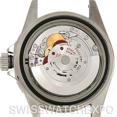 The image shows the back view of a Rolex Submariner 14060M Men's Stainless Steel Black Dial 14060M Men's Stainless Steel Black Dial, focusing on its open internal mechanism.