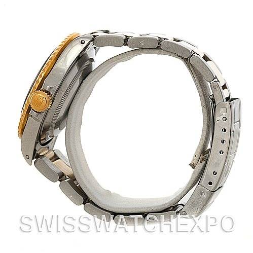 The image shows a side profile of a Rolex Submariner 16803 Men's Steel and Gold (two tone) Blue Dial 16803 Men's Steel and Gold (two tone) Blue Dial, highlighting the crown, case, and bracelet.