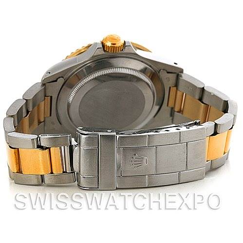 The image shows the back and bracelet of a Rolex Submariner 16803 Men's Steel and Gold (two tone) Blue Dial 16803 Men's Steel and Gold (two tone) Blue Dial, highlighting the clasp and crown logo.