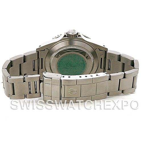 This image shows the back case and metal bracelet of a Rolex Submariner 14060M Men's Stainless Steel Black Dial 14060M Men's Stainless Steel Black Dial watch laid out flat.