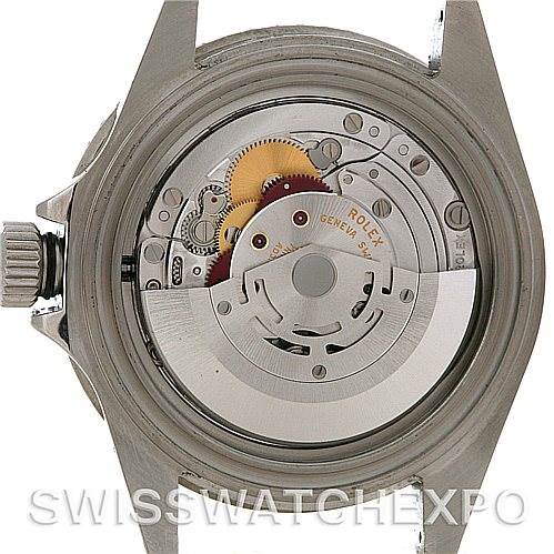 The image shows the movement mechanism of a Rolex Submariner 16610 Men
s Stainless Steel Black Dial 16610 Men
s Stainless Steel Black Dial model from a rear angle with the case back removed.