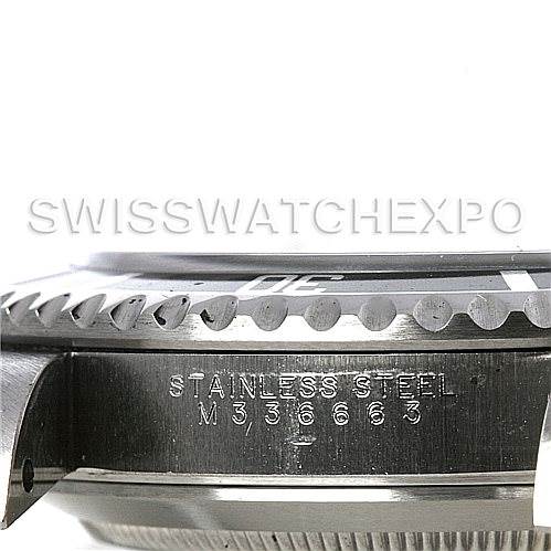 This image displays the side view of a Rolex Submariner 14060M Men's Stainless Steel Black Dial 14060M Men's Stainless Steel Black Dial bezel and the engraved stainless steel casing.