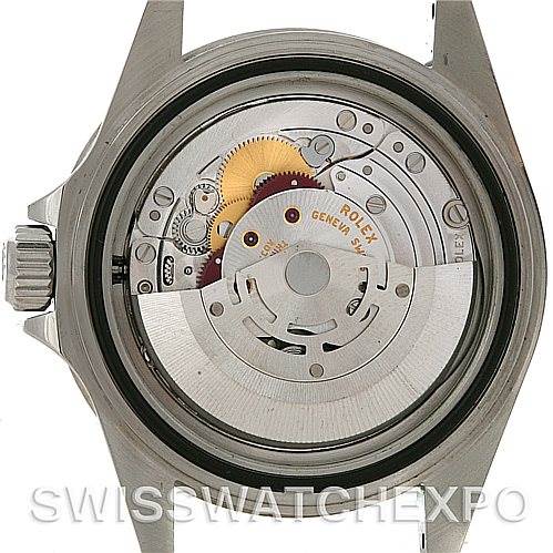 This image shows the inner mechanism of a Rolex Submariner 14060M Men's Stainless Steel Black Dial 14060M Men's Stainless Steel Black Dial watch, viewed from the back with the case opened.