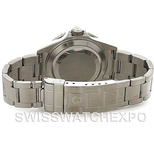 The image shows the back of a Rolex Submariner 16610 Men's Stainless Steel Black Dial 16610 Men's Stainless Steel Black Dial watch, highlighting its stainless steel case, bracelet, and clasp.