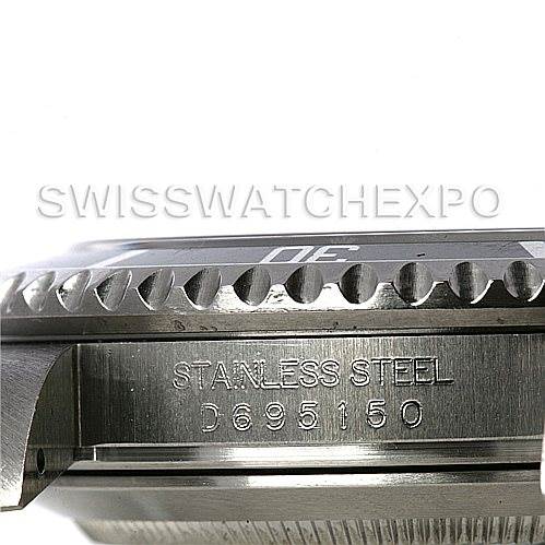 This image shows the side profile of the Rolex Submariner 16610 Men's Stainless Steel Black Dial 16610 Men's Stainless Steel Black Dial watch, focusing on the bezel and the engraved stainless steel case.