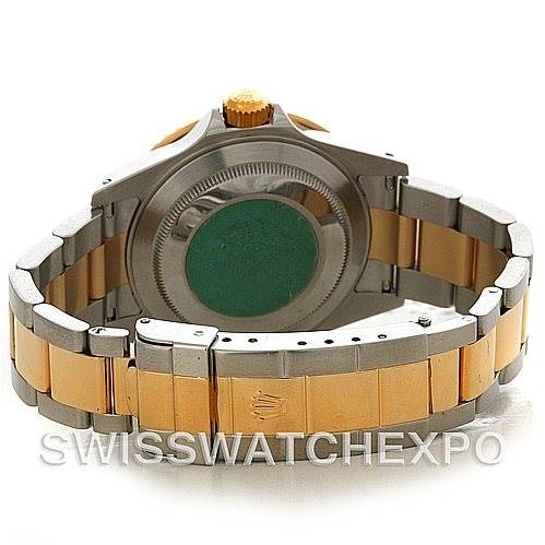 This image shows the rear view of a Rolex Submariner 16613 Men's Steel and Gold (two tone) Grey Dial 16613 Men's Steel and Gold (two tone) Grey Dial watch, including the case back and the bracelet.