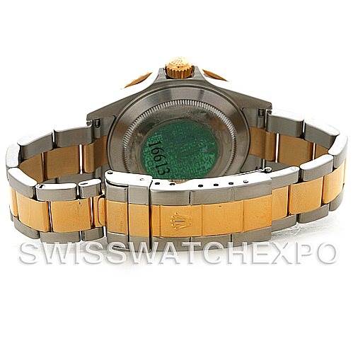 The image shows the back view of a Bentley model watch by Breitling, featuring a two-tone metal bracelet and clasp.