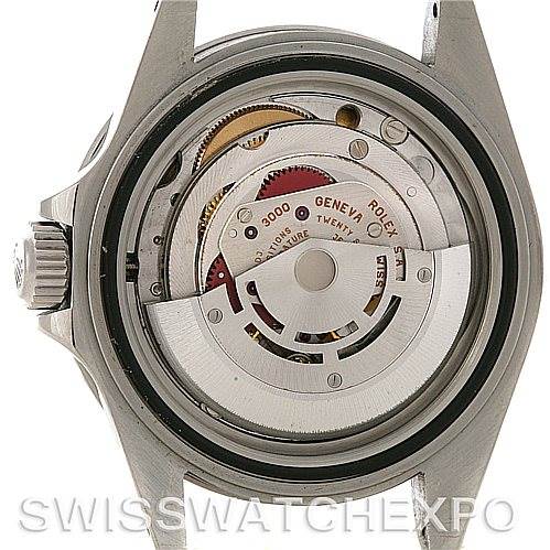 This image shows the back view of a Rolex Submariner 14060M Men's Stainless Steel Black Dial 14060M Men's Stainless Steel Black Dial, highlighting the inner mechanical movement.