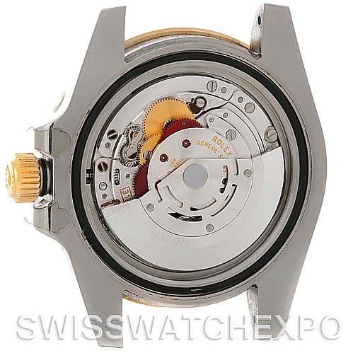 This image shows the back view of a Rolex Submariner 116613BLSO Men's Steel and Gold (two tone) Blue Dial 116613BLSO Men's Steel and Gold (two tone) Blue Dial watch, displaying its exposed internal movement and components.