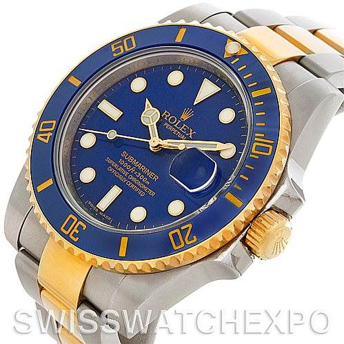 The image shows a Rolex Submariner 116613BLSO Men's Steel and Gold (two tone) Blue Dial 116613BLSO Men's Steel and Gold (two tone) Blue Dial watch at a slight side angle, highlighting its blue face, bezel, and two-tone bracelet.