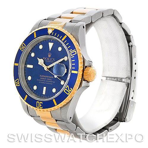 This image shows a Rolex Submariner 16613 Men's Steel and Gold (two tone) Blue Dial 16613 Men's Steel and Gold (two tone) Blue Dial watch in a three-quarter angle, highlighting the face, bezel, crown, and part of the bracelet.