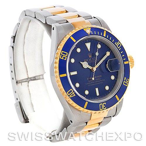 This image shows a Rolex Submariner 16613 Men's Steel and Gold (two tone) Blue Dial 16613 Men's Steel and Gold (two tone) Blue Dial watch at a three-quarter angle, highlighting the blue dial, gold accents, and stainless steel bracelet.