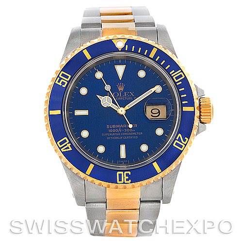 This Rolex Submariner 16613 Men's Steel and Gold (two tone) Blue Dial 16613 Men's Steel and Gold (two tone) Blue Dial watch is shown from a front angle, displaying the blue dial, bezel, and two-tone metal bracelet.