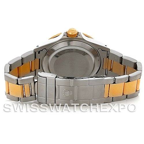 This image shows the back case, crown, and bracelet of a Rolex Submariner 16613 Men's Steel and Gold (two tone) Blue Dial 16613 Men's Steel and Gold (two tone) Blue Dial watch, emphasizing the two-tone metal design.