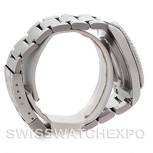 The image shows a side view of a Rolex Submariner 16610 Men's Stainless Steel Black Dial 16610 Men's Stainless Steel Black Dial watch, highlighting the bracelet and case.