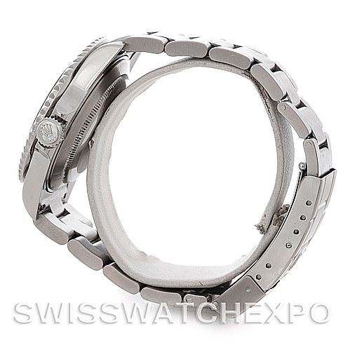 The image shows a side view of a Rolex Submariner 16610 Men's Stainless Steel Black Dial 16610 Men's Stainless Steel Black Dial watch, highlighting the bracelet, crown, and part of the bezel.