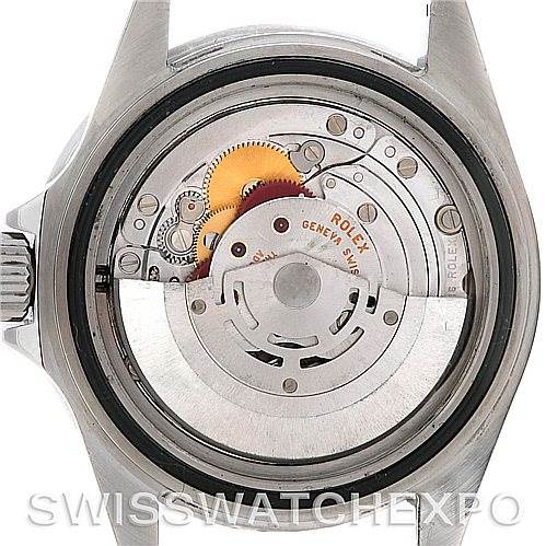 This image shows the internal mechanism of a Rolex Submariner 16610 Men's Stainless Steel Black Dial 16610 Men's Stainless Steel Black Dial watch from a rear view with the case back removed.