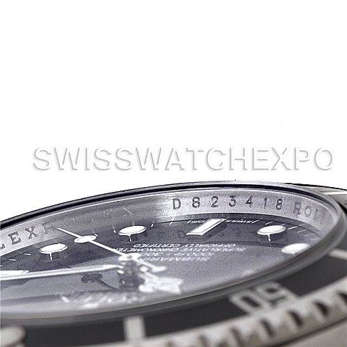 This image shows a close-up, side angle of the dial and bezel of the Rolex Submariner 14060M Men's Stainless Steel Black Dial 14060M Men's Stainless Steel Black Dial watch.