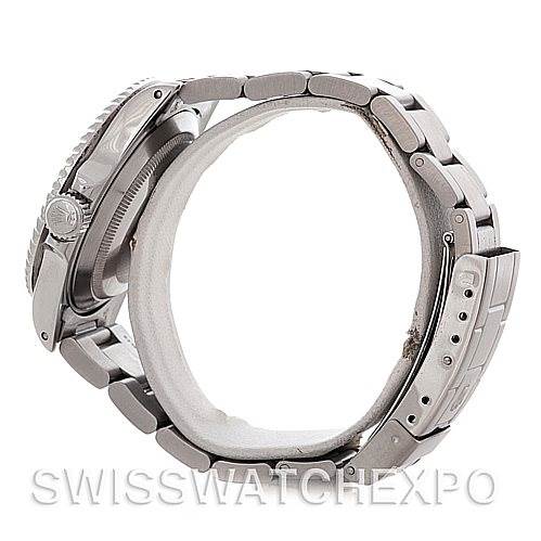 The image shows a side view of a Rolex Submariner 16610 Men's Stainless Steel Black Dial 16610 Men's Stainless Steel Black Dial watch, focusing on the crown, case, and part of the bracelet clasp.