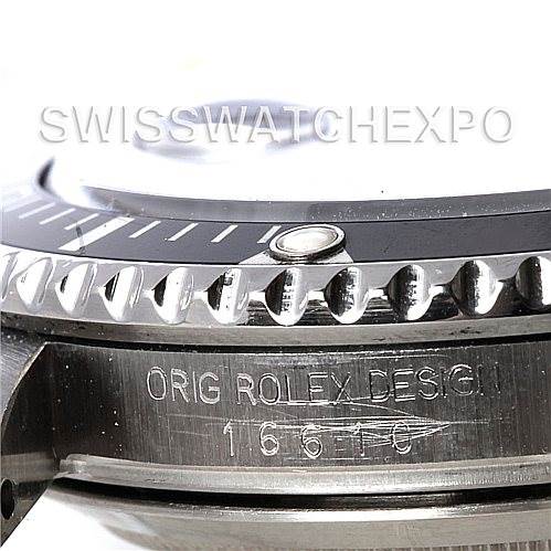 The image shows a close-up side view of the bezel and engraving on the casing of a Rolex Submariner 16610 Men's Stainless Steel Black Dial 16610 Men's Stainless Steel Black Dial model 16610.