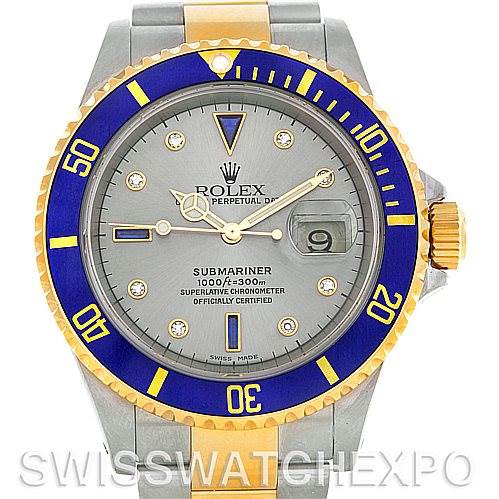 This image shows a front angle view of a Rolex Submariner 16613 Men's Steel and Gold (two tone) Grey Dial 16613 Men's Steel and Gold (two tone) Grey Dial watch, highlighting the blue and gold bezel, dial, and bracelet.