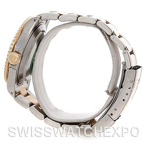 The image shows a side profile of a Rolex Submariner 16613 Men's Steel and Gold (two tone) Grey Dial 16613 Men's Steel and Gold (two tone) Grey Dial watch, highlighting the bracelet, clasp, and crown.