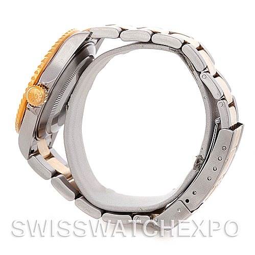 The image shows a side view of the Rolex Submariner 16613 Men's Steel and Gold (two tone) Black Dial 16613 Men's Steel and Gold (two tone) Black Dial watch, highlighting the bracelet, crown, and case.