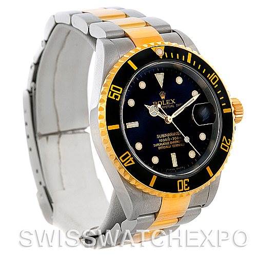 This Rolex Submariner 16613 Men's Steel and Gold (two tone) Black Dial 16613 Men's Steel and Gold (two tone) Black Dial watch is shown at an angle displaying its dial, bezel, case, and bracelet with gold accents and links.