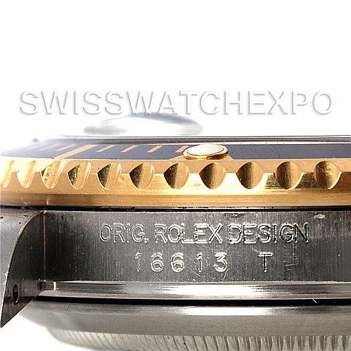 This image shows a side view of the case and bezel of a Rolex Submariner 16613 Men's Steel and Gold (two tone) Black Dial 16613 Men's Steel and Gold (two tone) Black Dial, highlighting the serial number engraving.