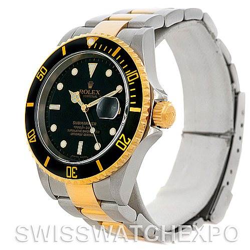 This image shows a Rolex Submariner 16613 Men's Steel and Gold (two tone) Black Dial 16613 Men's Steel and Gold (two tone) Black Dial watch angled to display the bezel, dial, and part of the bracelet.
