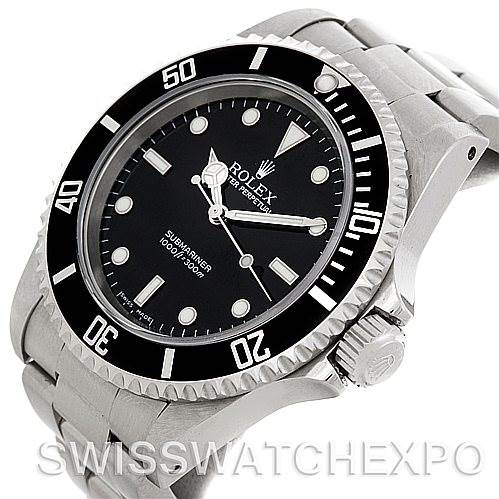 This image shows a Rolex Submariner watch at an angle highlighting the face, bezel, crown, and part of the bracelet.