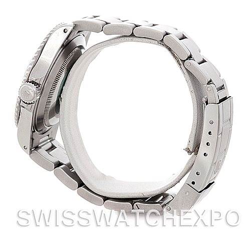 This image shows a side view of the Tank Solo model by Cartier, focusing on its metal bracelet, clasp, and case.