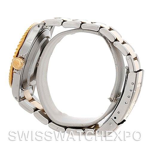 This image shows the side profile and bracelet of a Rolex Submariner 16613 Men's Steel and Gold (two tone) Blue Dial 16613 Men's Steel and Gold (two tone) Blue Dial watch.