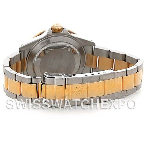 This image shows the back view of a Rolex Submariner 16613 Men's Steel and Gold (two tone) Blue Dial 16613 Men's Steel and Gold (two tone) Blue Dial watch, focusing on the stainless steel and gold bracelet and the case back.