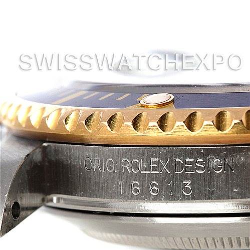 This image shows a close-up of the side of the Rolex Submariner 16613 Men's Steel and Gold (two tone) Blue Dial 16613 Men's Steel and Gold (two tone) Blue Dial 16613, focusing on the bezel and engraved case.