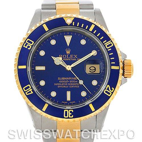 The image shows a frontal view of a Rolex Submariner 16613 Men's Steel and Gold (two tone) Blue Dial 16613 Men's Steel and Gold (two tone) Blue Dial watch, highlighting its blue dial, two-tone bezel, and bracelet.