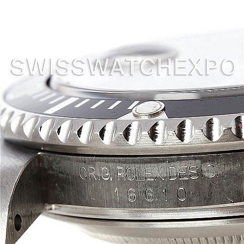 The image shows a close-up of the side of a Rolex Submariner 16610 Men's Stainless Steel Black Dial 16610 Men's Stainless Steel Black Dial watch, highlighting the bezel, part of the case, and the model number (16610).