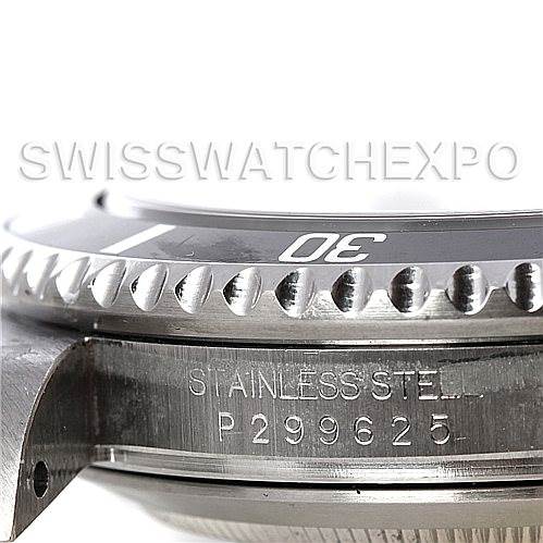 This image shows a close-up side view of the Rolex Submariner 16610 Men's Stainless Steel Black Dial 16610 Men's Stainless Steel Black Dial model, featuring the stainless steel bezel and engraved serial number.
