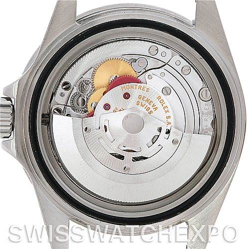 This image shows the back view of a Rolex Submariner 16610 Men's Stainless Steel Black Dial 16610 Men's Stainless Steel Black Dial, revealing its internal mechanical movement components.