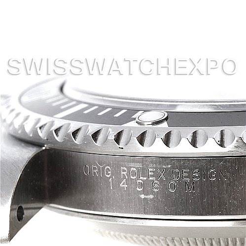 The image shows a close-up side view of a Rolex Submariner 14060 Men's Stainless Steel Black Dial 14060 Men's Stainless Steel Black Dial watch, focusing on the bezel, crown guard, and engraved model number.