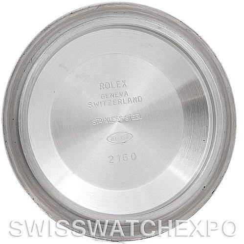 The image shows the inside case back of a Rolex Submariner 14060 Men's Stainless Steel Black Dial 14060 Men's Stainless Steel Black Dial watch, displaying the brand, model, and case material information.