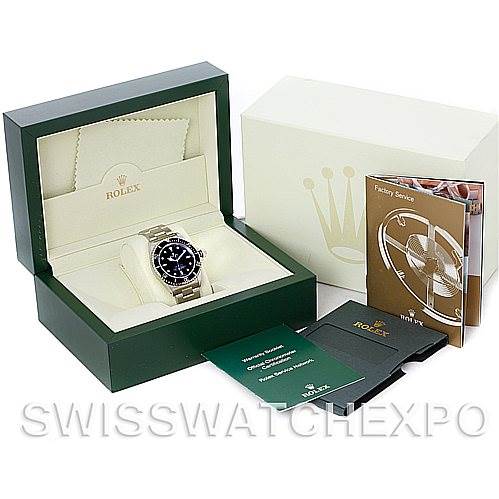 The image shows a Rolex Submariner 14060 Men's Stainless Steel Black Dial 14060 Men's Stainless Steel Black Dial watch at a front angle, with its green box, warranty card, and documentation.
