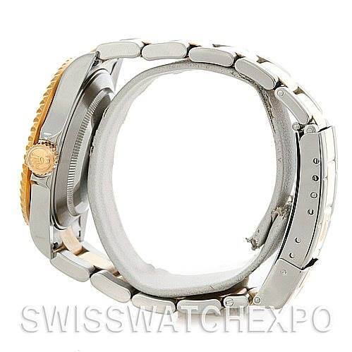 This image shows a side profile of a Rolex Submariner 16613 Men's Steel and Gold (two tone) Blue Dial 16613 Men's Steel and Gold (two tone) Blue Dial watch, focusing on the crown, case, and bracelet clasp.