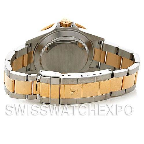 This image shows the back and bracelet of a Rolex Submariner 16613 Men's Steel and Gold (two tone) Blue Dial 16613 Men's Steel and Gold (two tone) Blue Dial watch, featuring a two-tone steel and gold design.