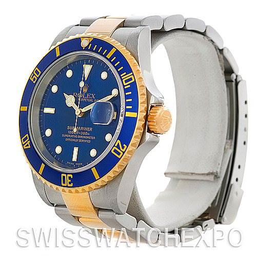 The image shows a Rolex Submariner 16613 Men's Steel and Gold (two tone) Blue Dial 16613 Men's Steel and Gold (two tone) Blue Dial watch with a blue dial and bezel, viewed at a slight angle from the front and side.