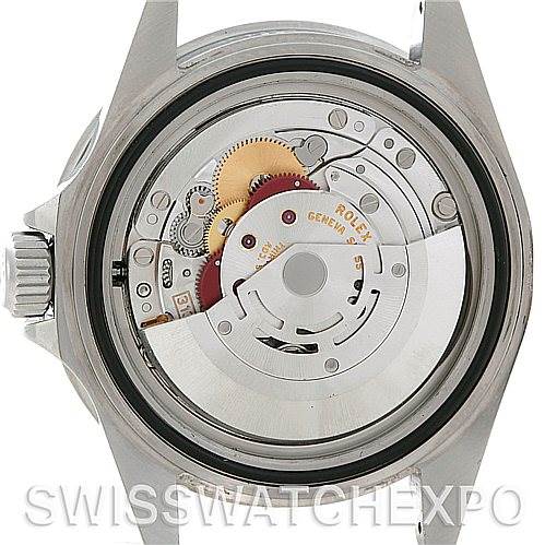 The image shows the back view of the Rolex Submariner 16610 Men's Stainless Steel Black Dial 16610 Men's Stainless Steel Black Dial watch, highlighting the movement and internal mechanism.