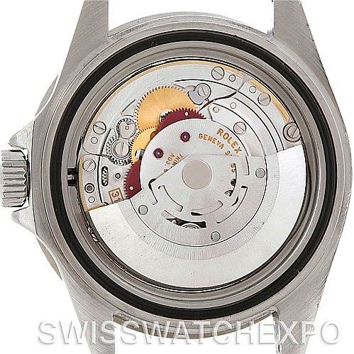 This image shows the back view of a Rolex Submariner 16610 Men's Stainless Steel Black Dial 16610 Men's Stainless Steel Black Dial, highlighting the internal movement mechanism.