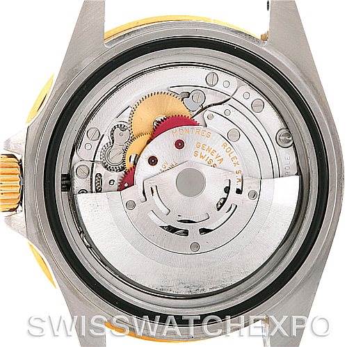 This image shows the internal mechanism of a Rolex Submariner 16613 Men's Steel and Gold (two tone) Black Dial 16613 Men's Steel and Gold (two tone) Black Dial watch, viewed from the back with the caseback removed.