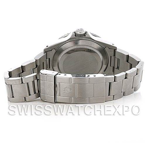 The image shows the back view of a Rolex Submariner 16610 Men's Stainless Steel Black Dial 16610 Men's Stainless Steel Black Dial watch, highlighting its case back and metal bracelet with a visible clasp.